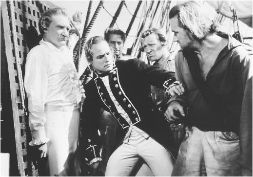 Trevor Howard (left) with Marlon Brando, Richard Harris, and Percy Herbert in Mutiny on the Bounty