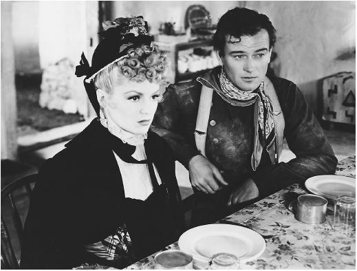 Claire Trevor with John Wayne in Stagecoach